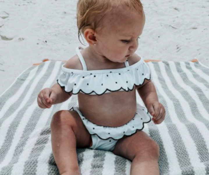 24 Black and White baby swimsuits, bikinis & rashguards