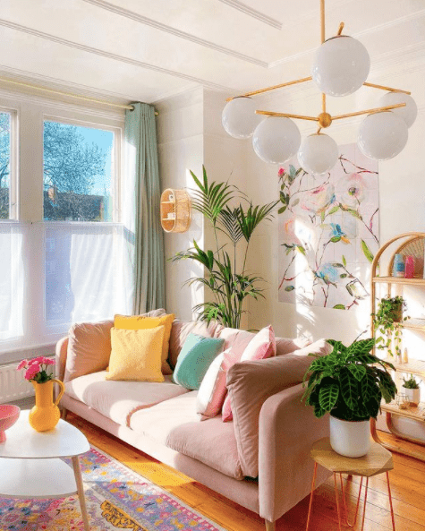 cute living room with velvet pink sofa