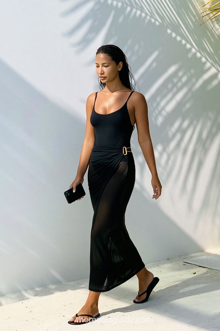 all black chic minimal modern summer styling midi maxi skirt with black one piece for resrot, maldives, ibiza beach club. luxury, minimalit beach outfit
