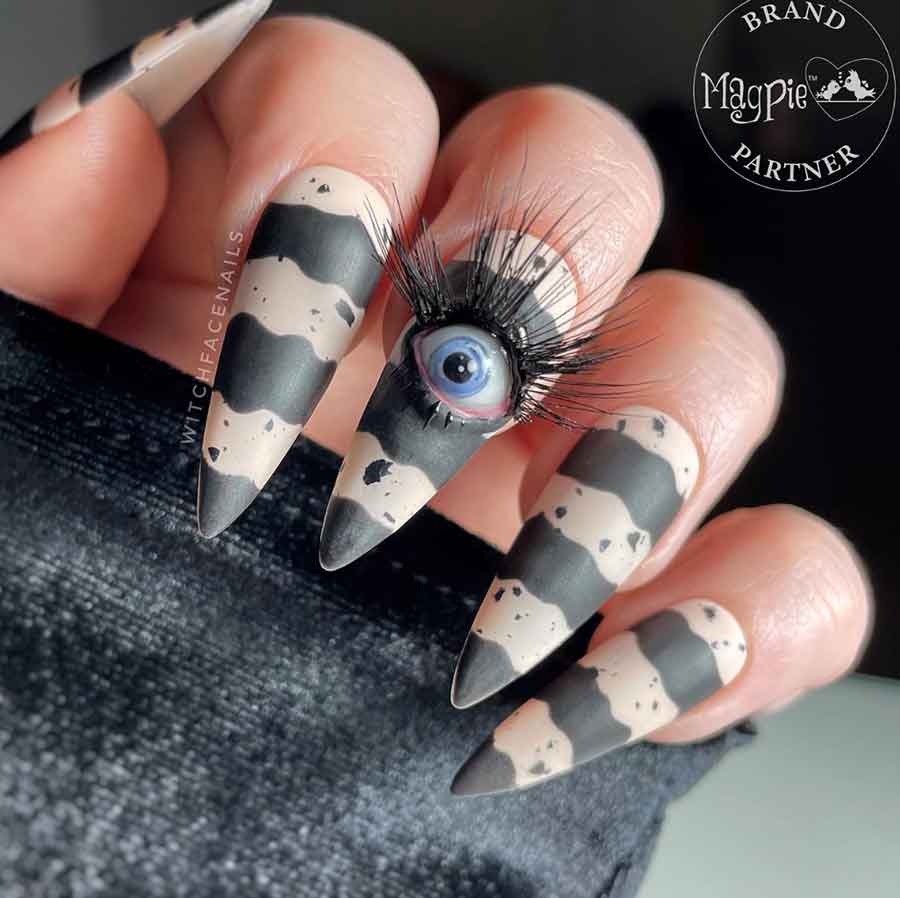 black spooky stilletto halloween nails