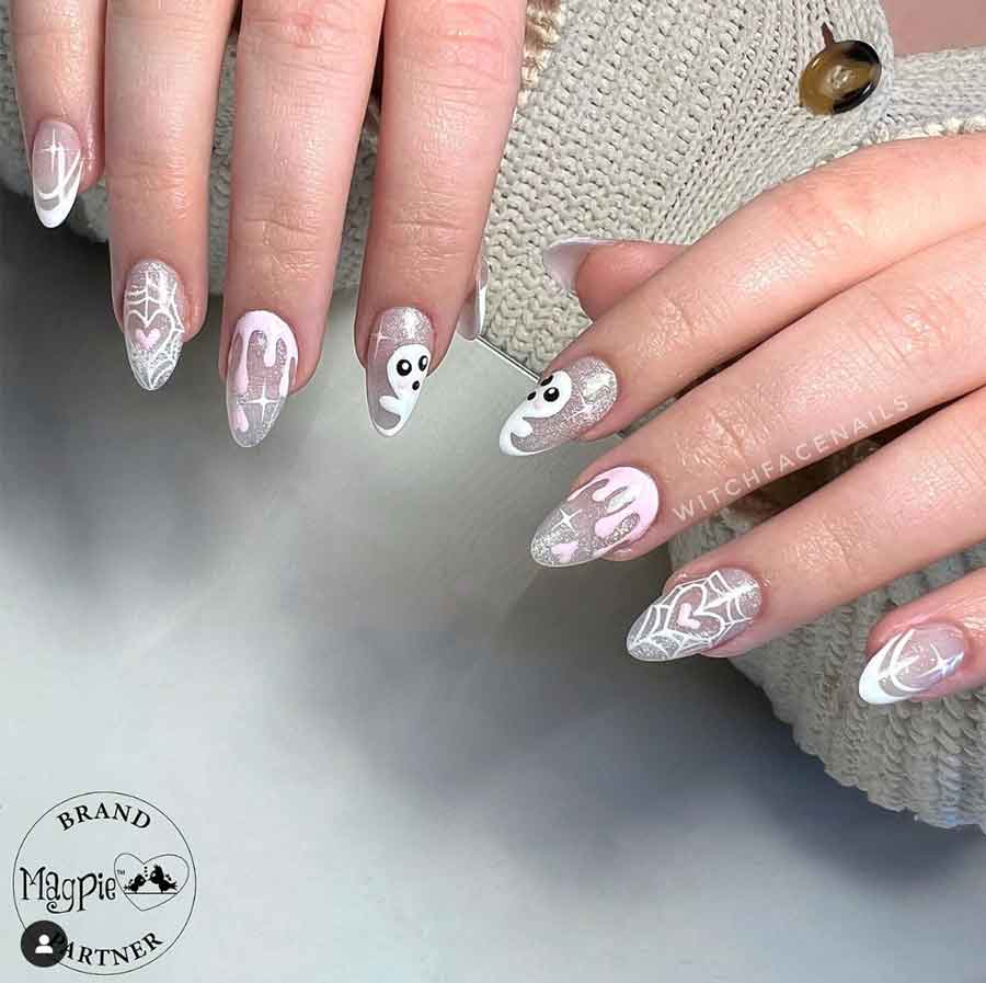 cute white almond halloween nails with glitter