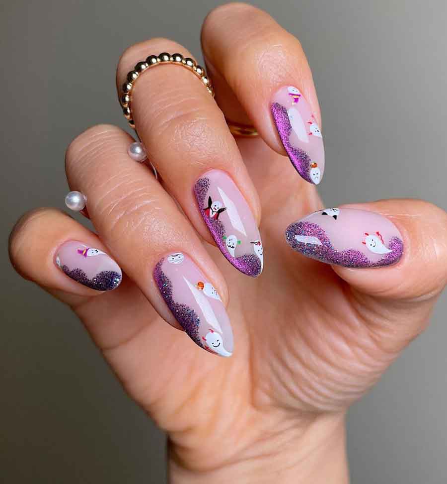 purple halloween nails with glitter