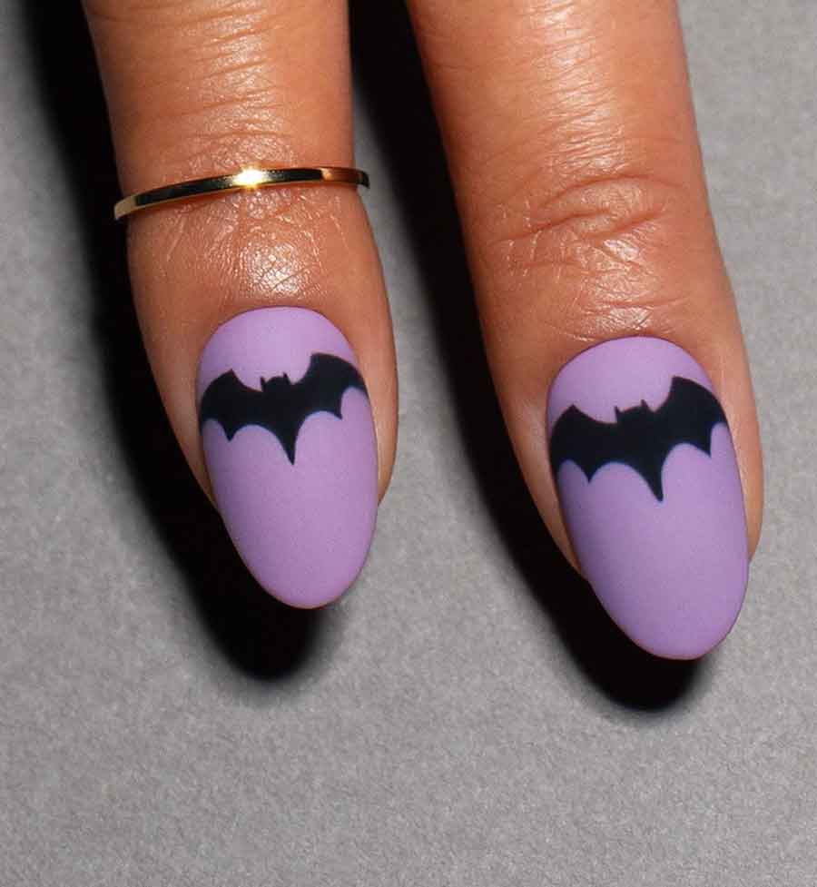 black and purple bat halloween nails
