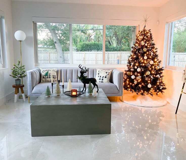 living room with black christmas tree