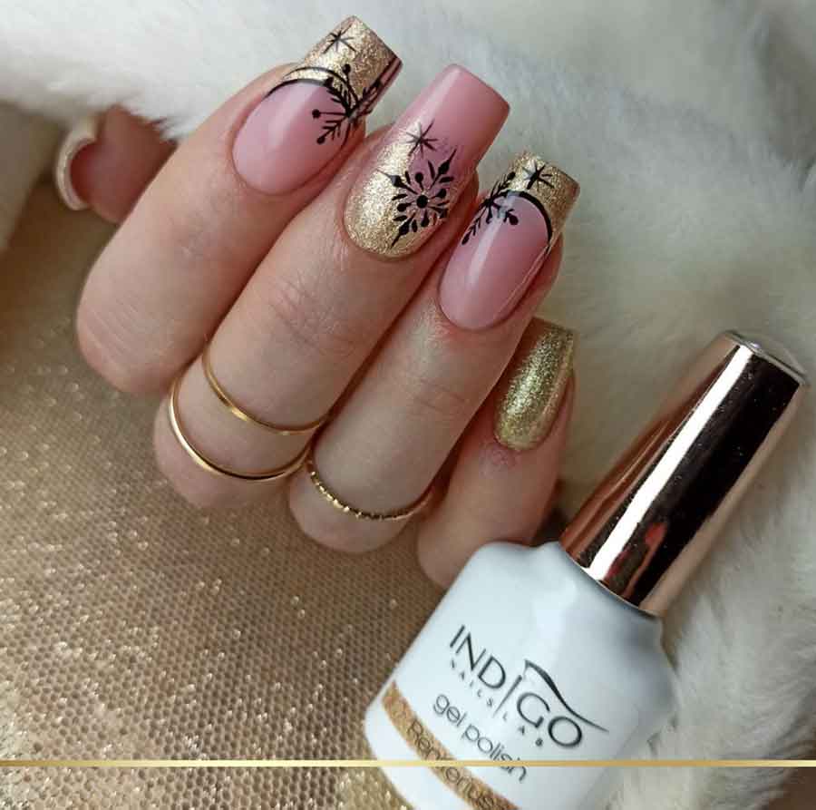 pink natural gold an black christmas nails