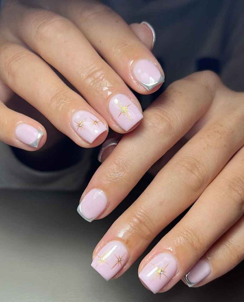 soft pink and gold holiday nails