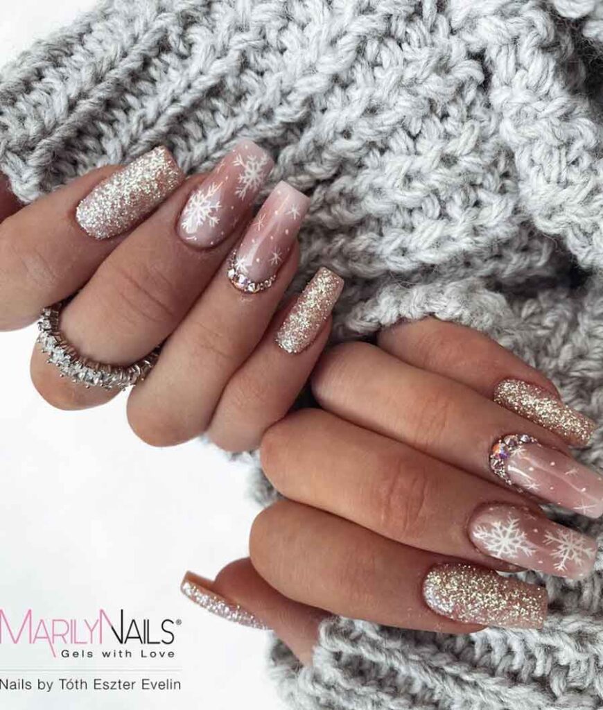 winter wonderland nails with gems an snowflakes