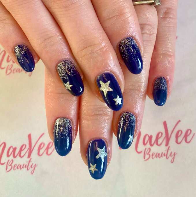 Gold Stars navy blue nails