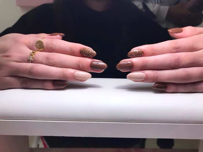 Shades of light brown & glitter oval nails