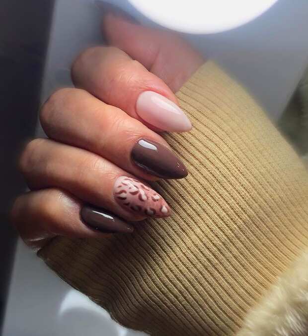long almond brown nails with animal print