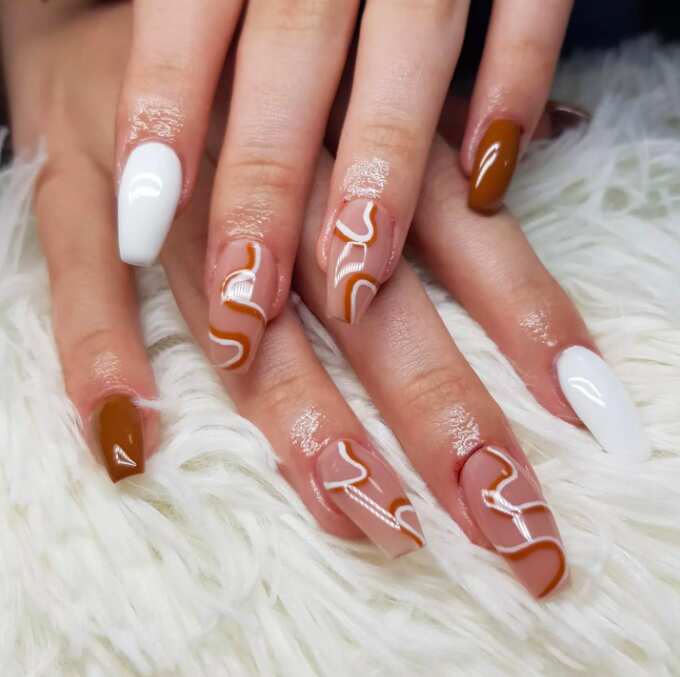 white and brown abstract nail art 