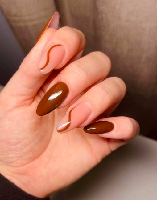 long round brown swirl nails