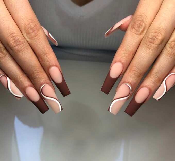 Brown tips & white swirl extra long square nails