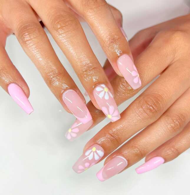 long square nails with pink french tips and pink flower art