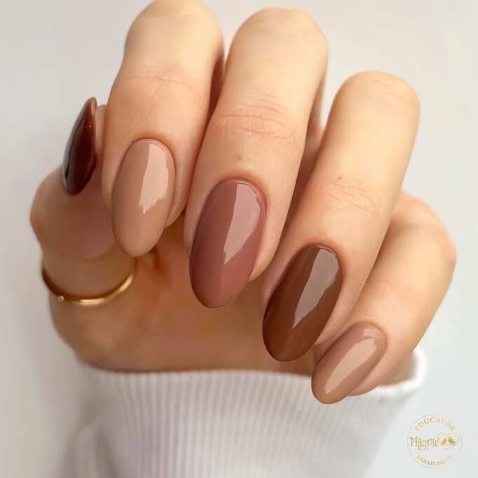 Nudes brown long round nails