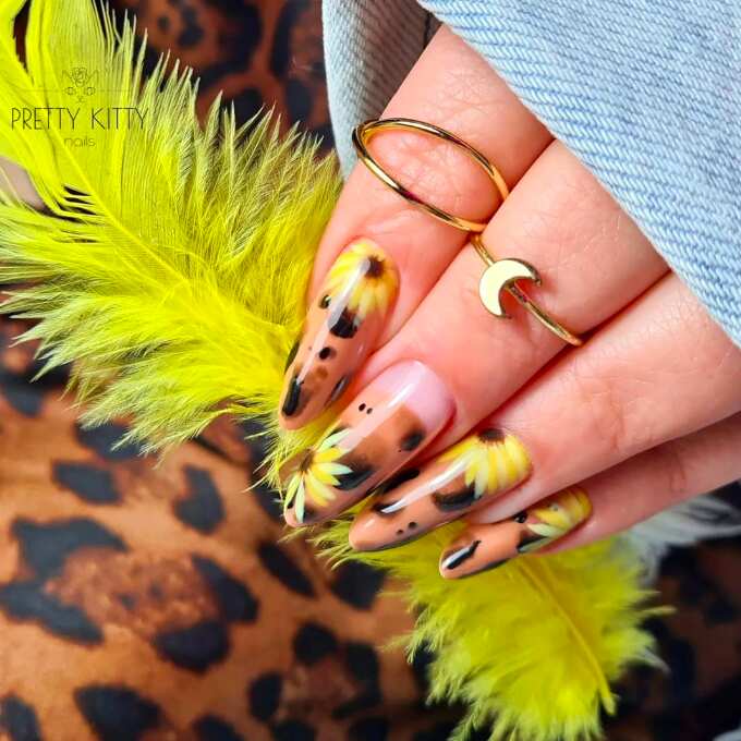 long nails with sunflower and animal print art design