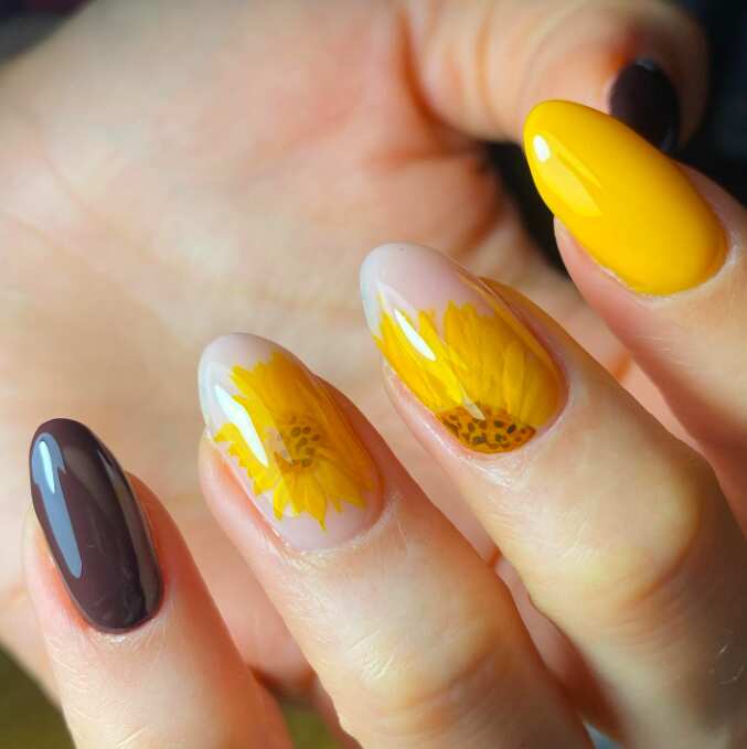 oval nails with handpainted sunflower art