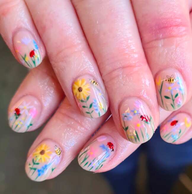 short oval nails with spring meadow sunflower design
