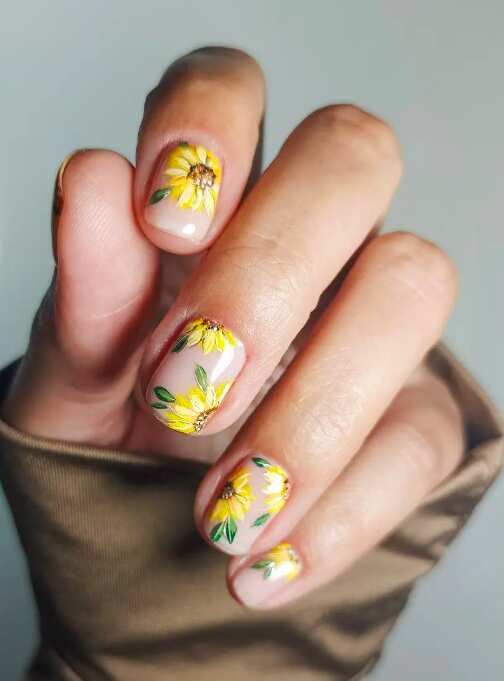 short nails with handpainted sunflower design art