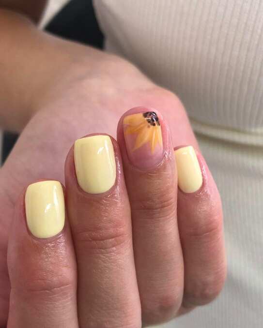 Beautiful manicure of soft lilac color on short square nails. Manicure for  women with a gel polish coating with a black inscription 23164929 Stock  Photo at Vecteezy