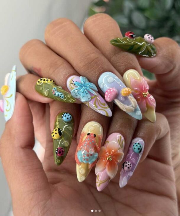 aesthetic 3d vacation nail 3d art with florg, ladybug, tropical leaves and flowers