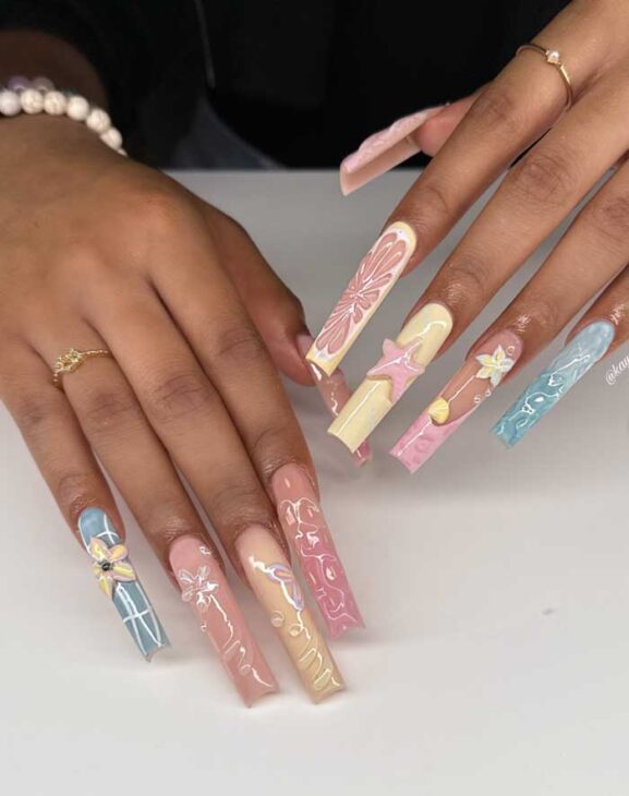 acrylic pastel blue pink and yellow tropical nails long coffin