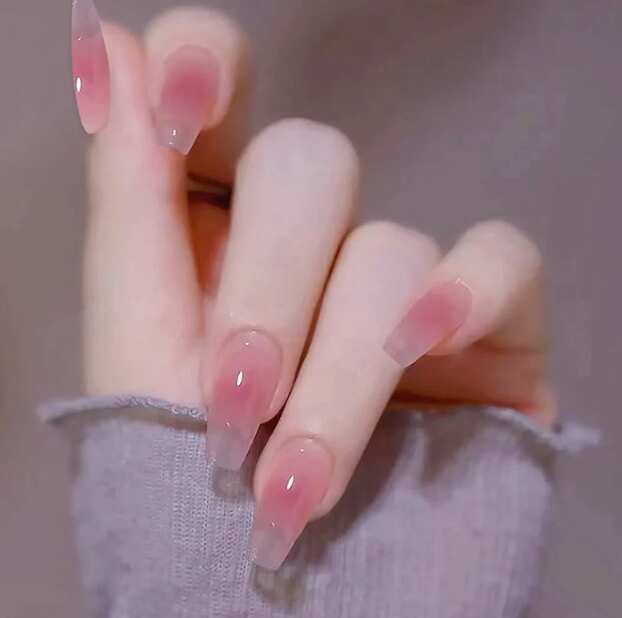 short coffin nails with glossy pink ombre design
