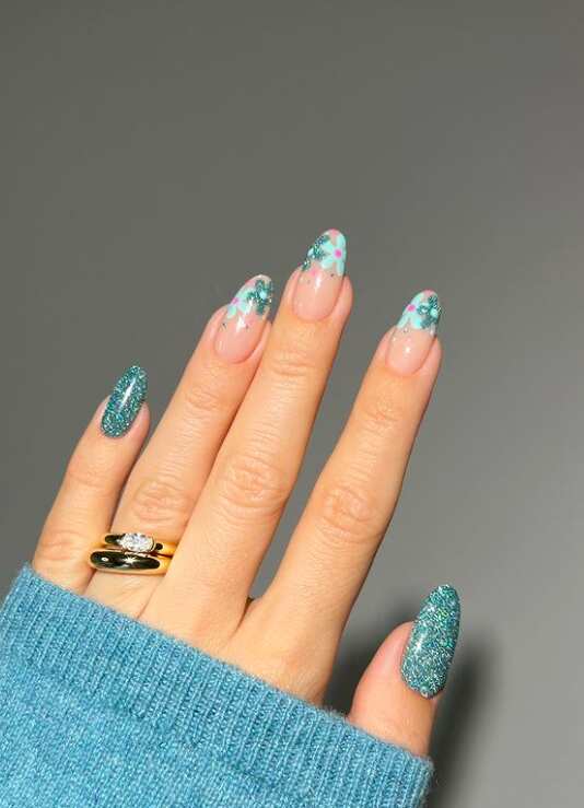 green floral glitter nail design