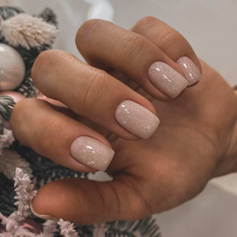short square nails with milky white glitter design
