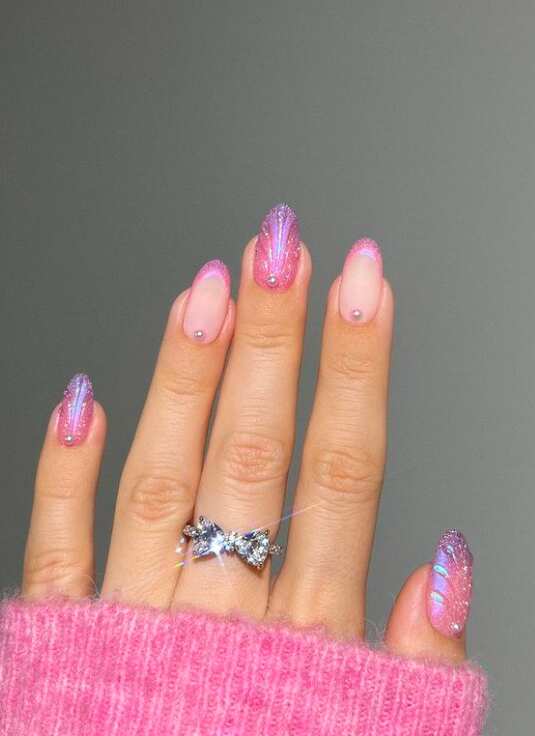 pink glitter mermaid nail design with tiny pearls