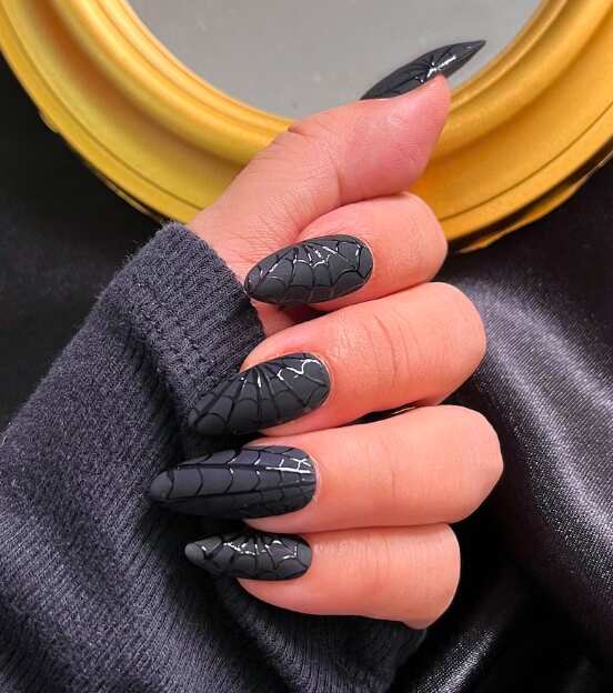 Matte black spiderweb nails