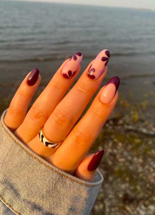 dark purple floral nail design