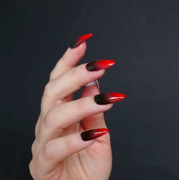 Black and red stiletto Halloween nails.