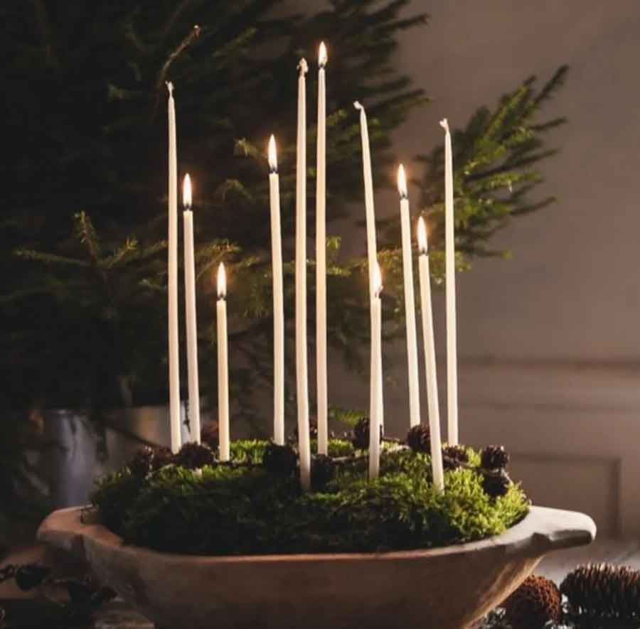 natural witchy christmas decor with candles