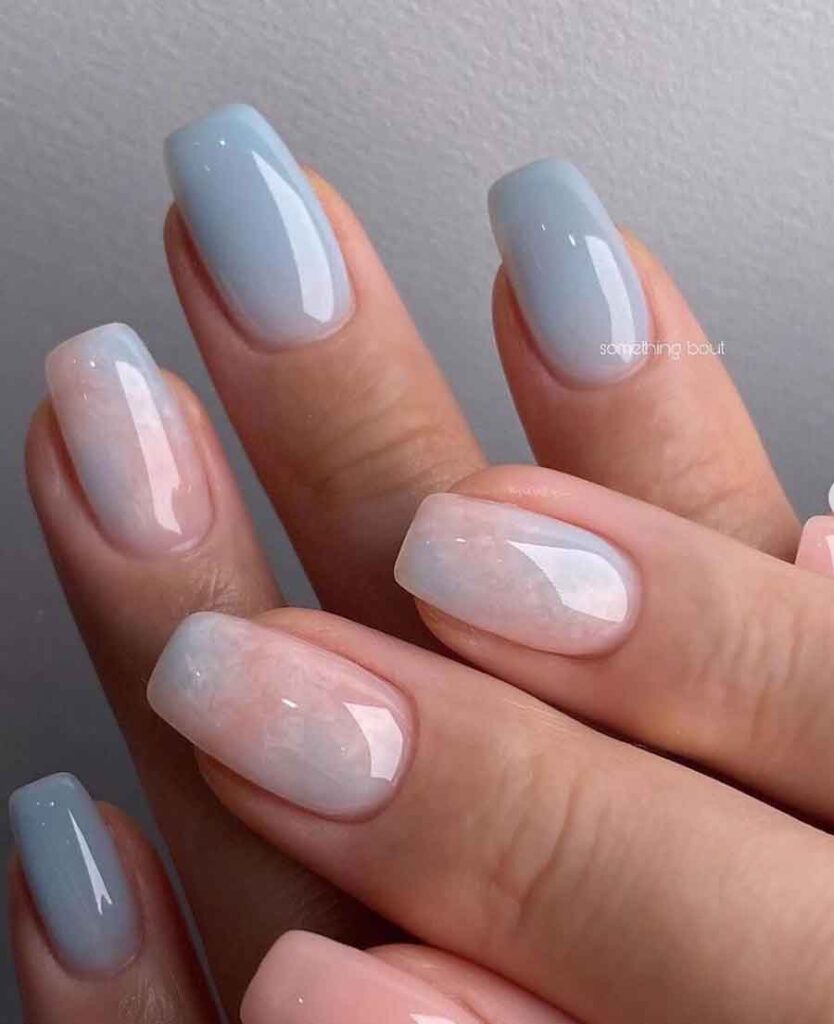 light blue and white marble nail effect