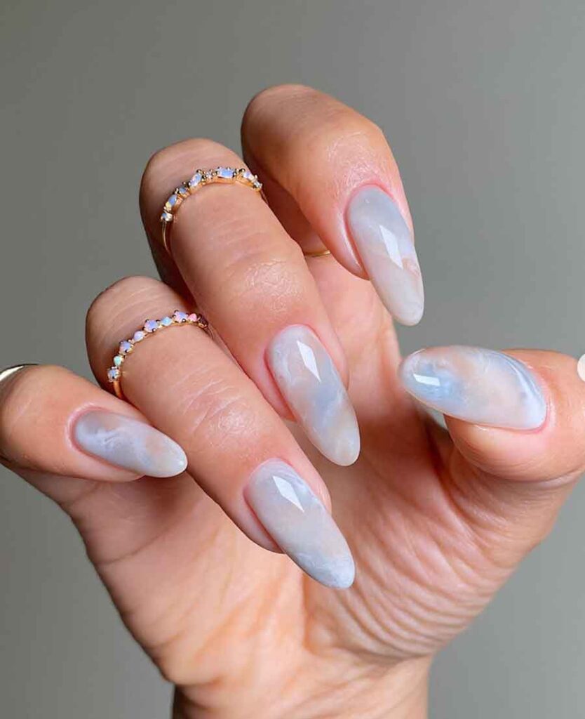 long light blue cloudy marble nails
