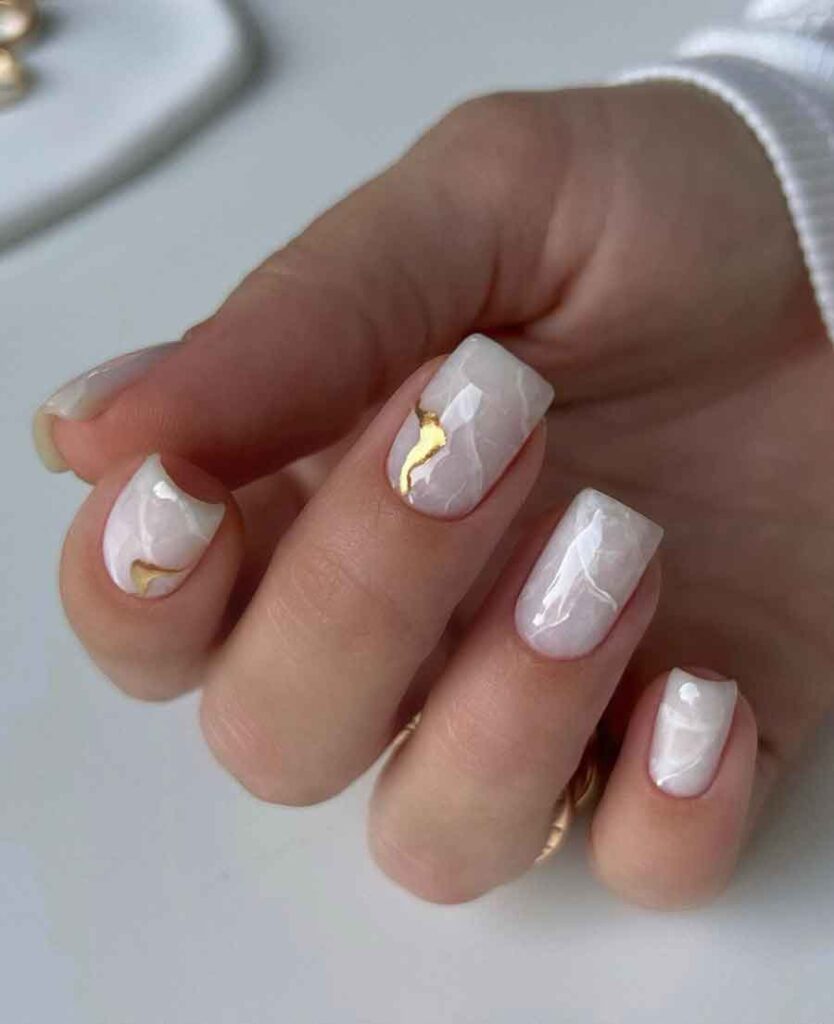 all white milky marble nails 
