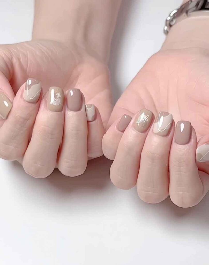 cute nude chocolate nails with organic nail deisgn