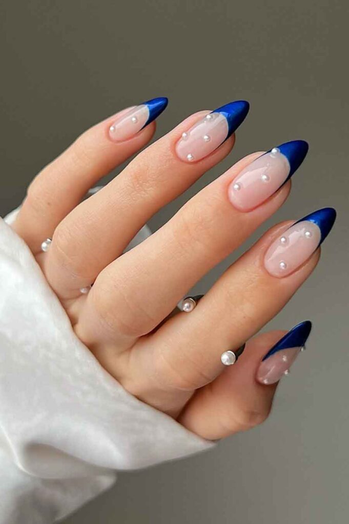 chic dark blue french tips with pearly decoration for sophisticated nail design