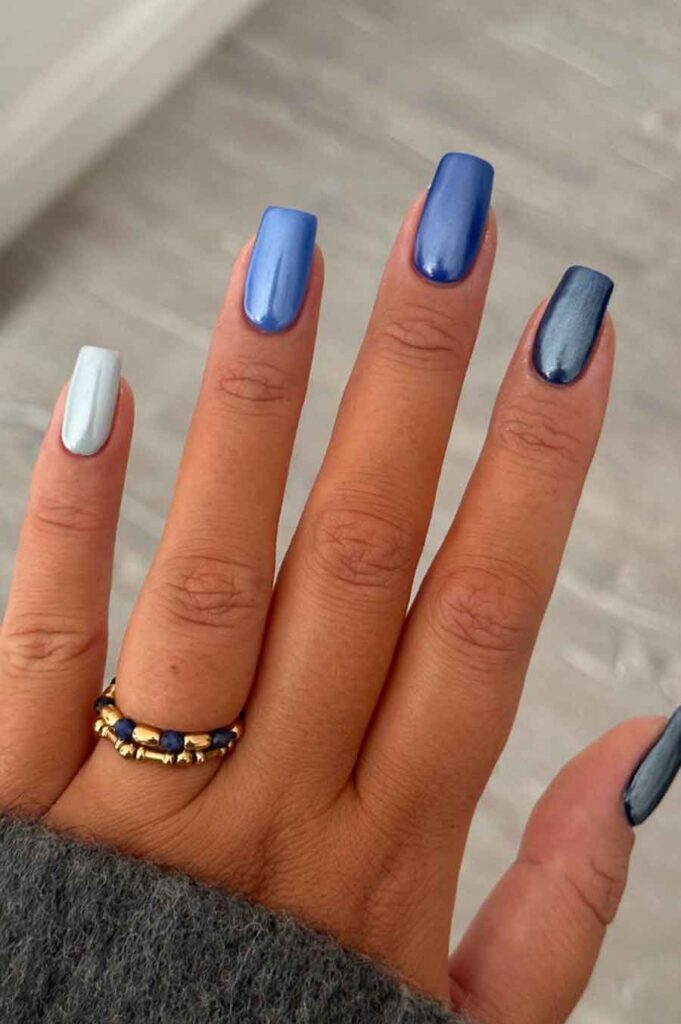 beautiful ombre blue chromed nails 