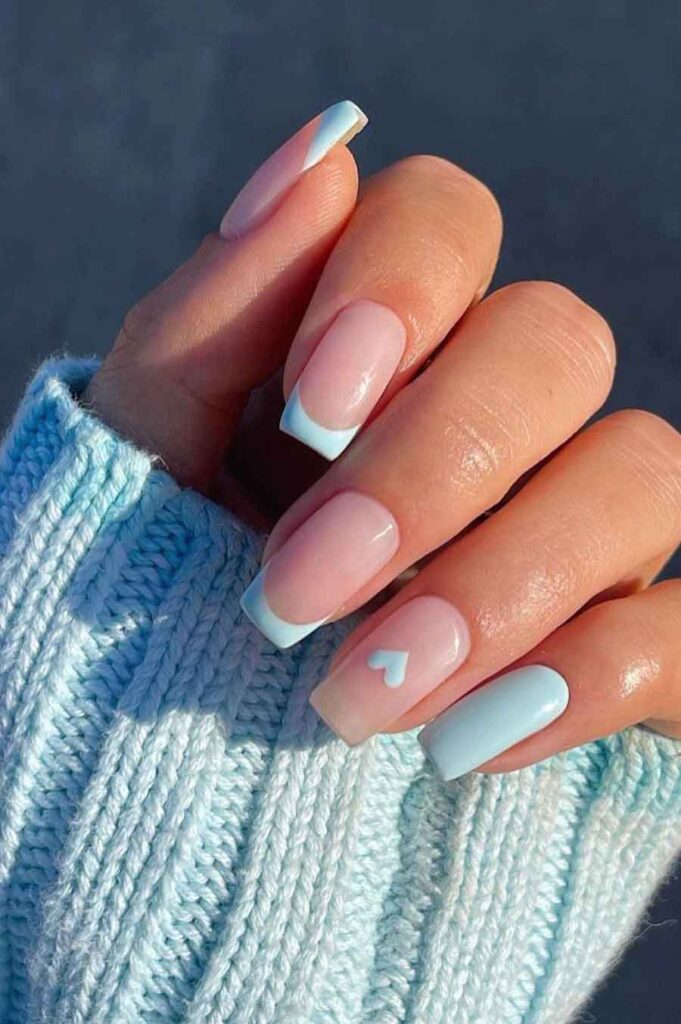 cute soft blue nails with french tips for a softcore manicure