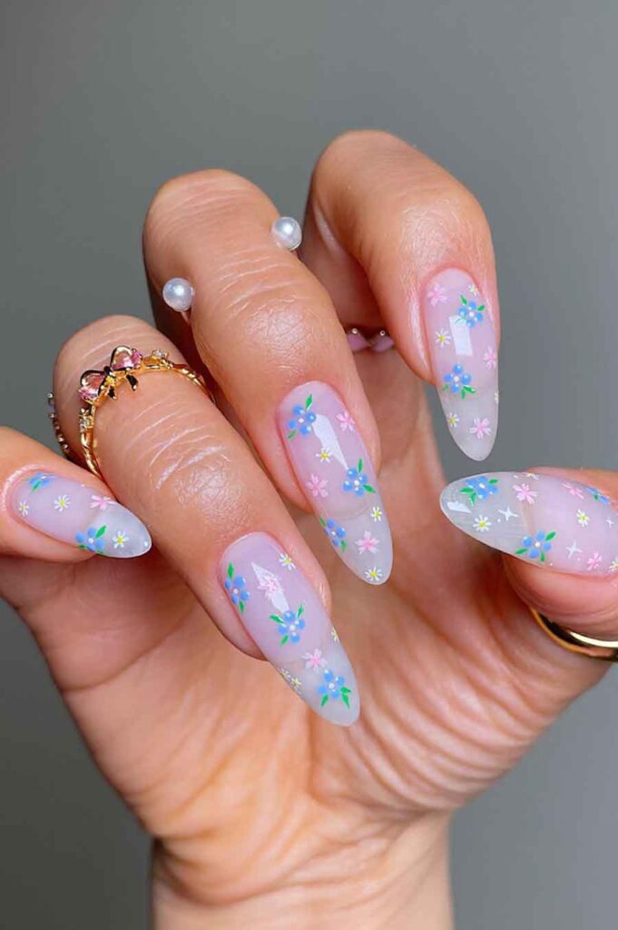 cute feminine and girly pink and light blue floral nail design for spring fairycore and princesscore aesthetics