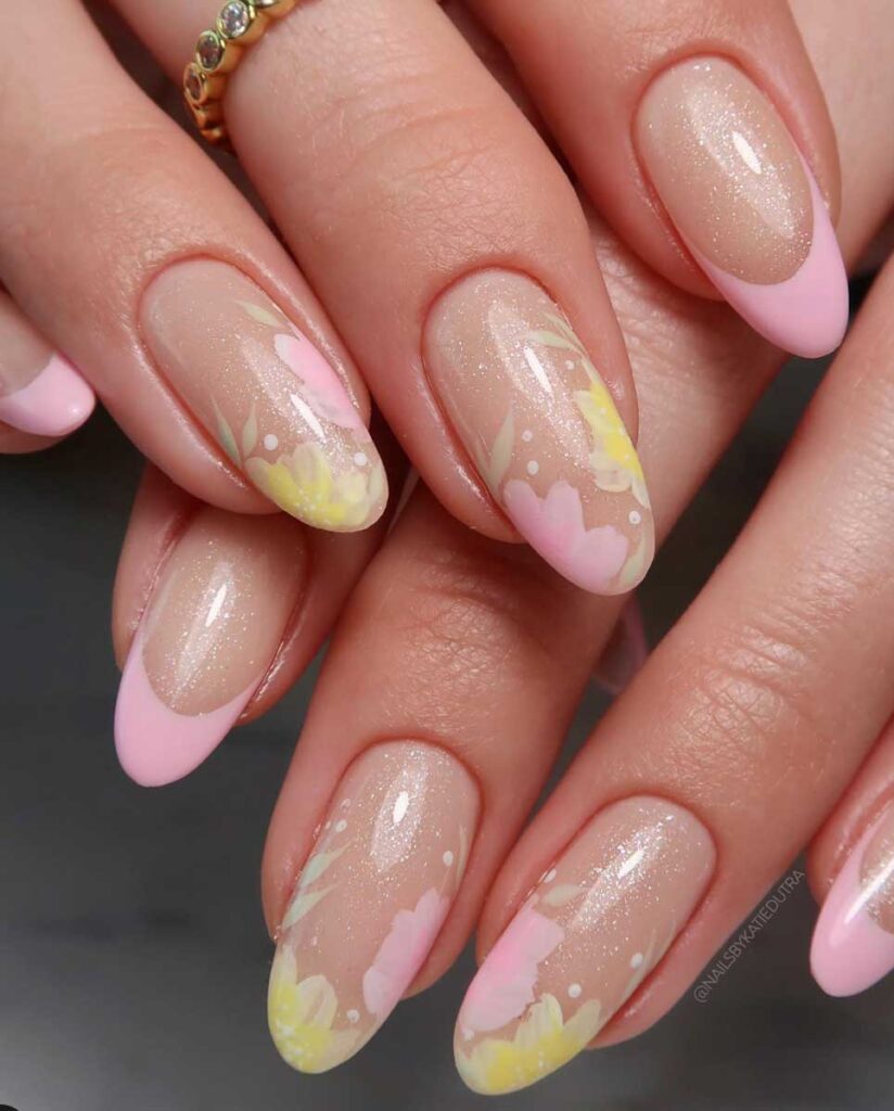 light pink and pastel yellow floral nail art with glitter for a springy easter manicure