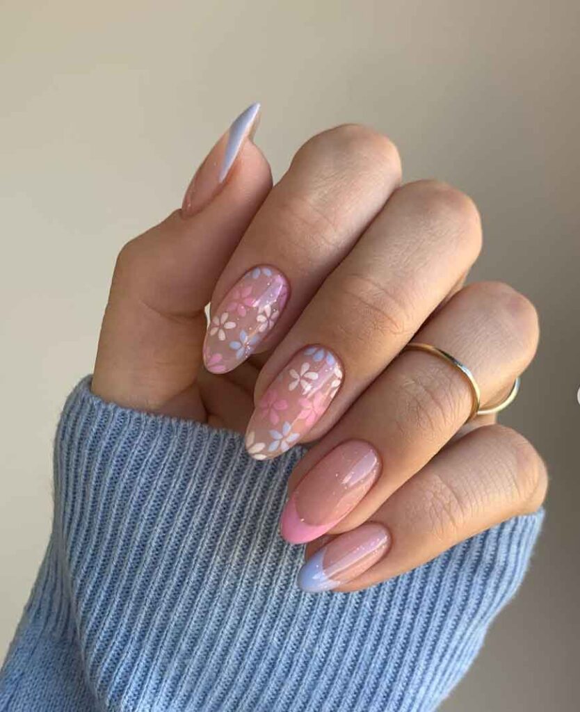 light pink floral nail art with glitter for spring and easter