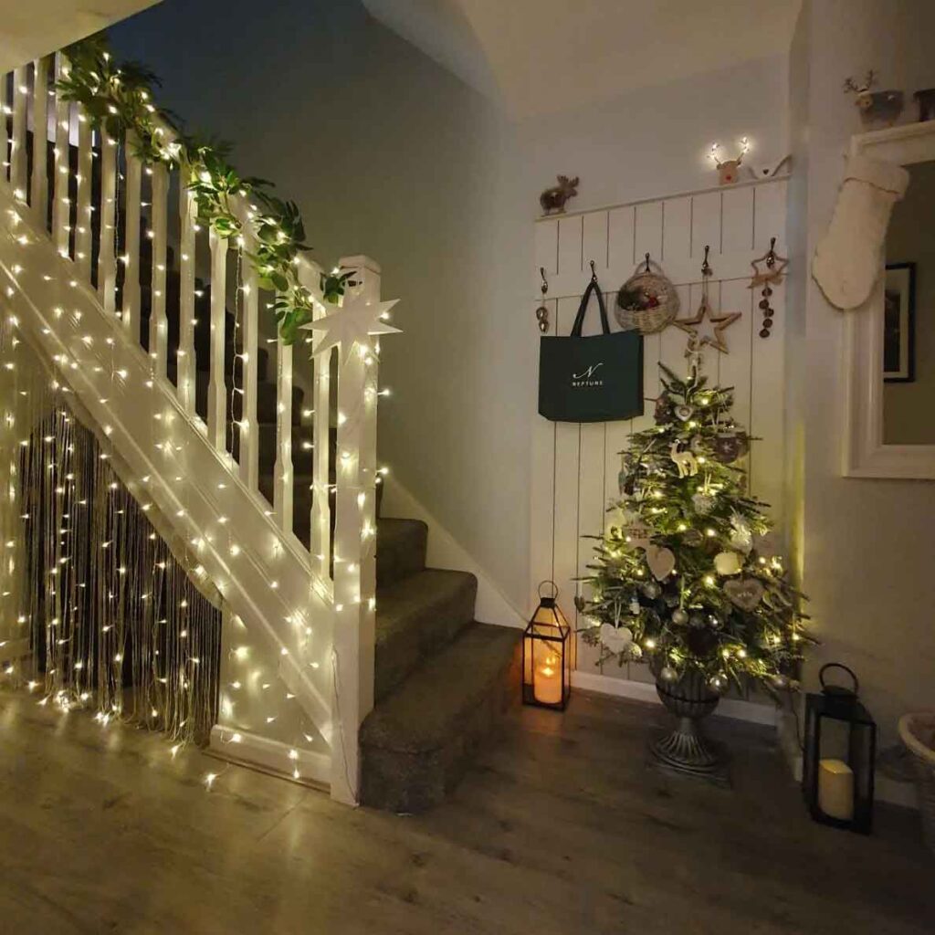 christmas fairy lights decor on stairs