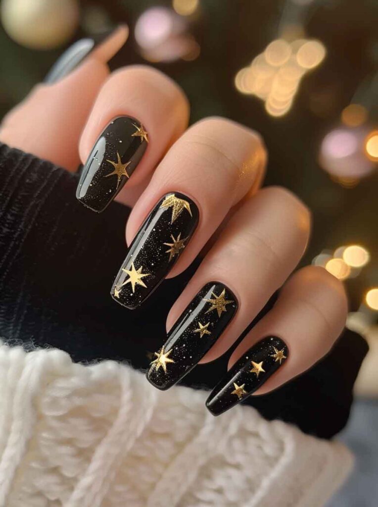 black and gold witchy celestial long coffin nails with stars