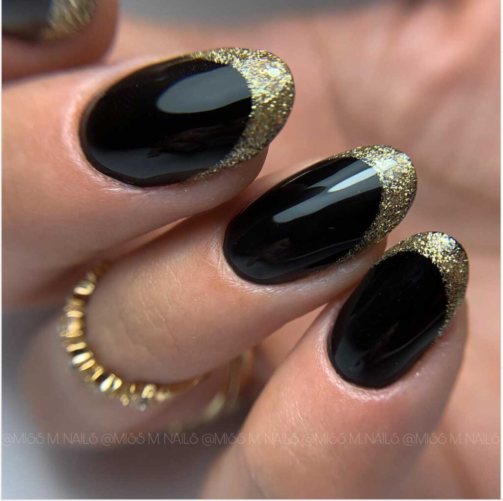 black and gold french tips with glitter