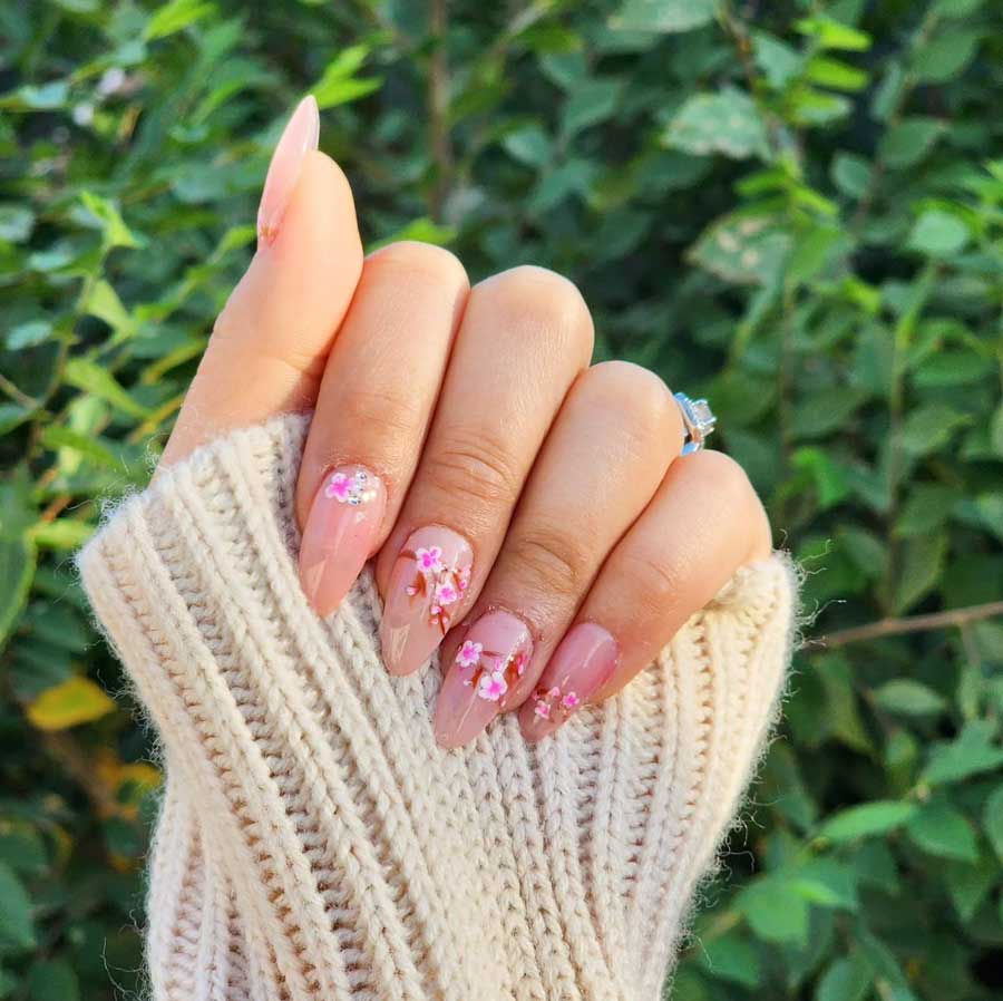 cherry blossom nails art on long nude nails