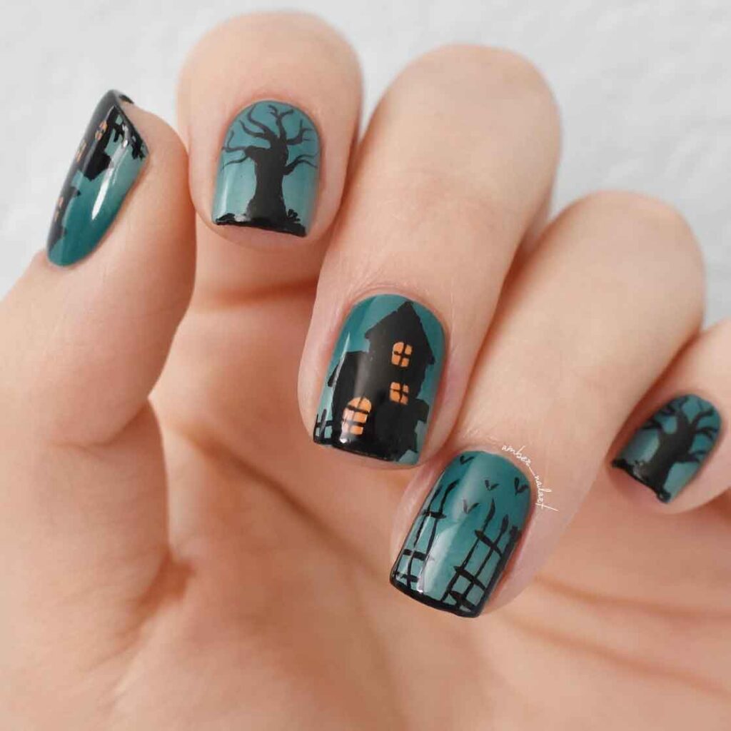teal and black halloween nails