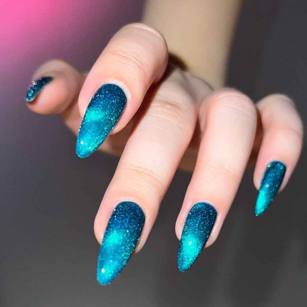 aesthetic teal nails with glitter